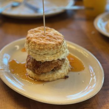 Maple Street Biscuit Company signature dishes The Five and Dime (Fried Chicken, Bacon, Cheddar, Sausage Gravy)The Squawking Goat (Fried Chicken, Goat Cheese, Pepper Jelly)Sticky Maple BiscuitIced Cinnamon Biscuits